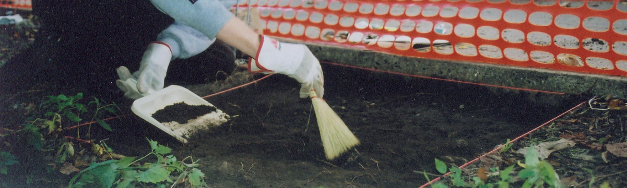A student sweeps for clues