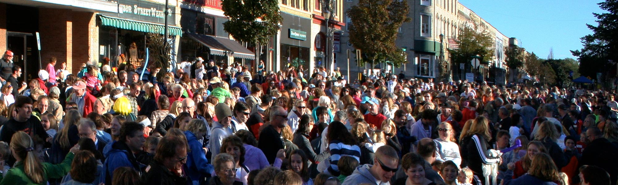 A group of people crowd downtown Ripon