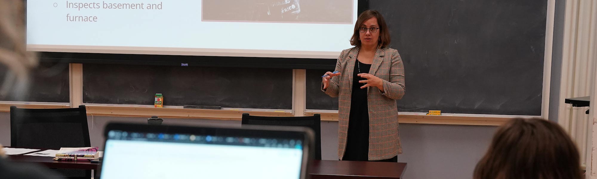 Mary Unger teaches in front of a class