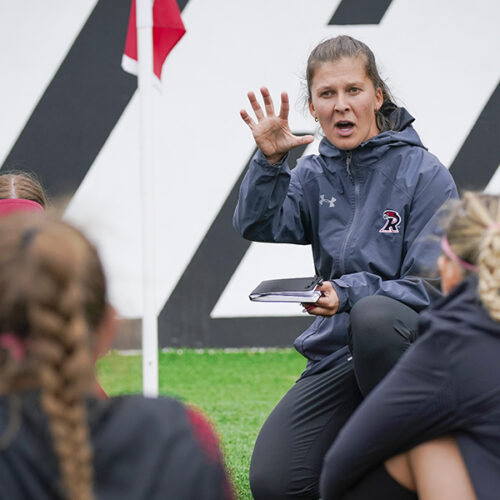 A coach energizes their team