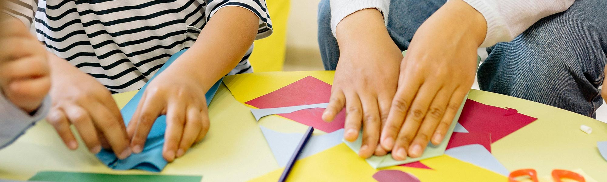 Photo by Yan Krukau: https://www.pexels.com/photo/woman-teaching-the-children-arts-and-crafts-8613300/