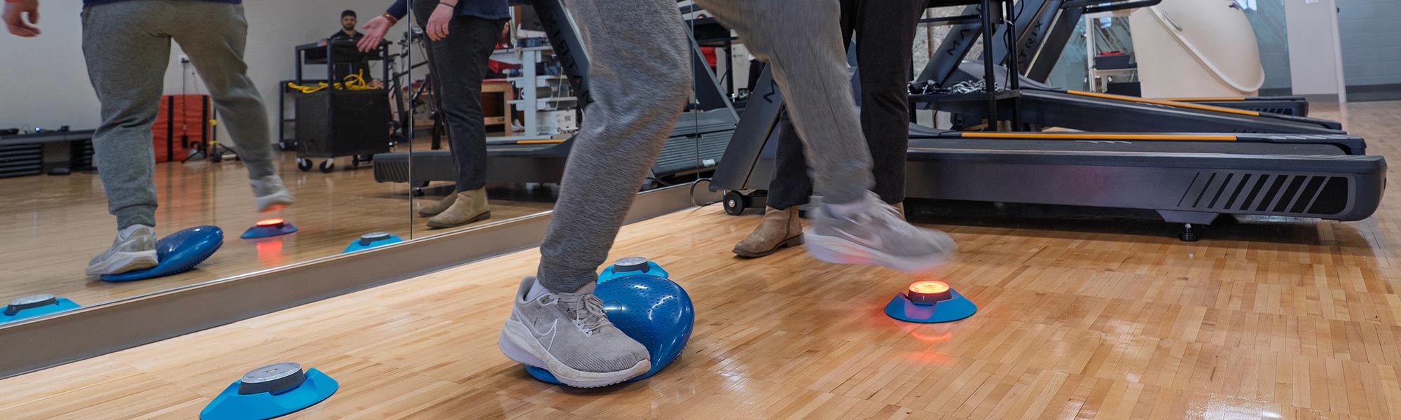 Professor and students try out new equipment