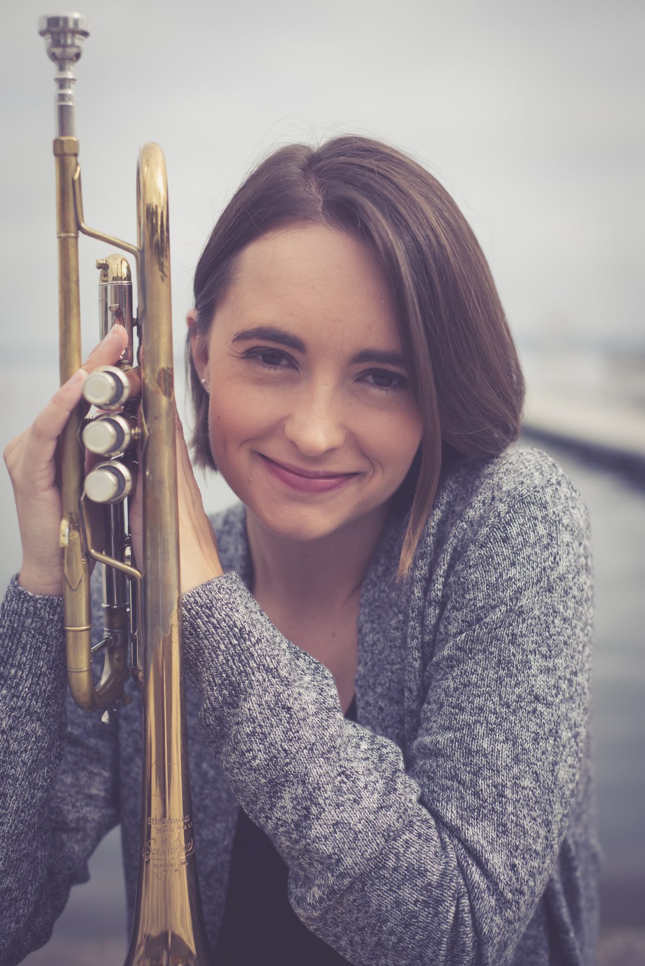 Jessica Jensen posing with her trumpet