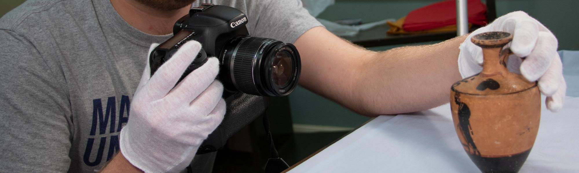 a student records ancient antiquities