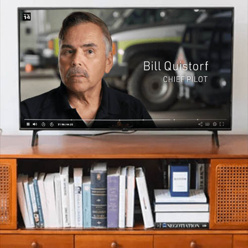 Bill Quistorf '80 segment on TV screen