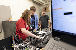 Brett Barwick, Lydia Wiley Deal and Garrett Radtke in Physics Lab in Farr Hall