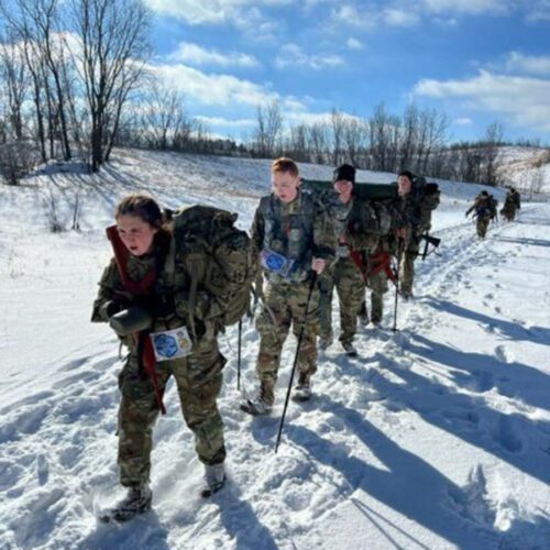ROTC cadets in skills testing along a snowy path