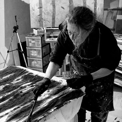 Artist working in their studio