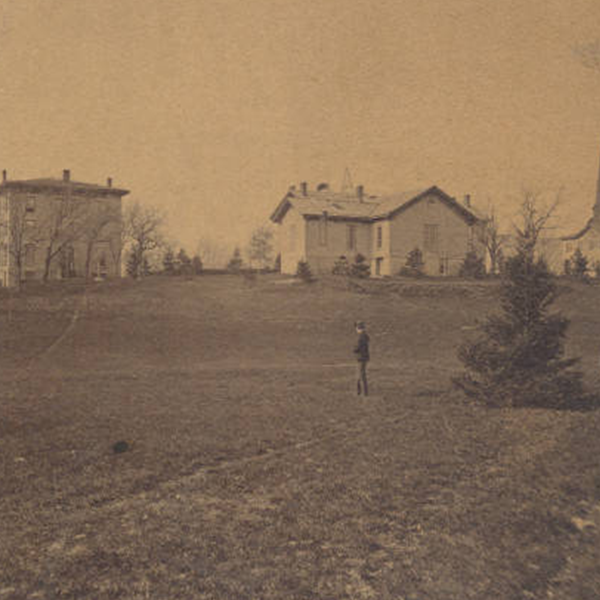 A man out standing in his field