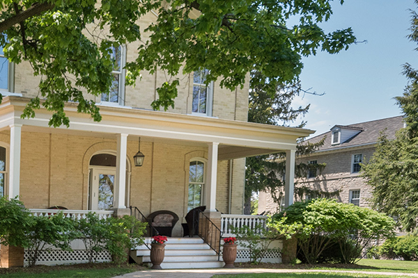 Evans admissions building in the spring