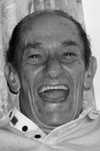 A man laughing loudly