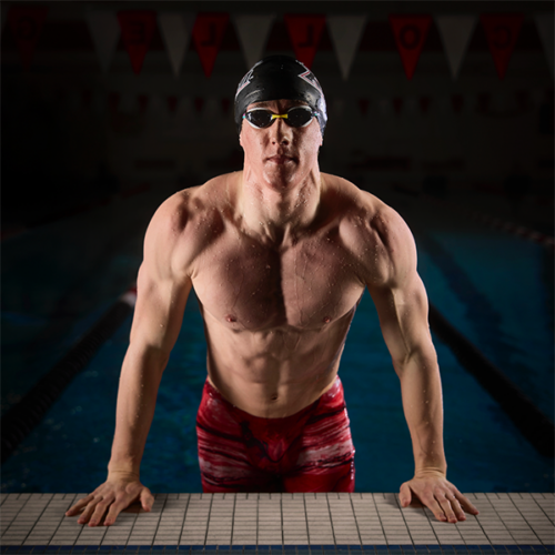 A member of the men's Ripon Swim team emerges from the pool