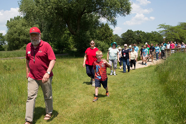 Wittler takes a group on a Ceresco Prairie walk 