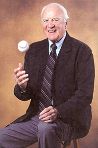 Gordie tosses a ball in the air.
