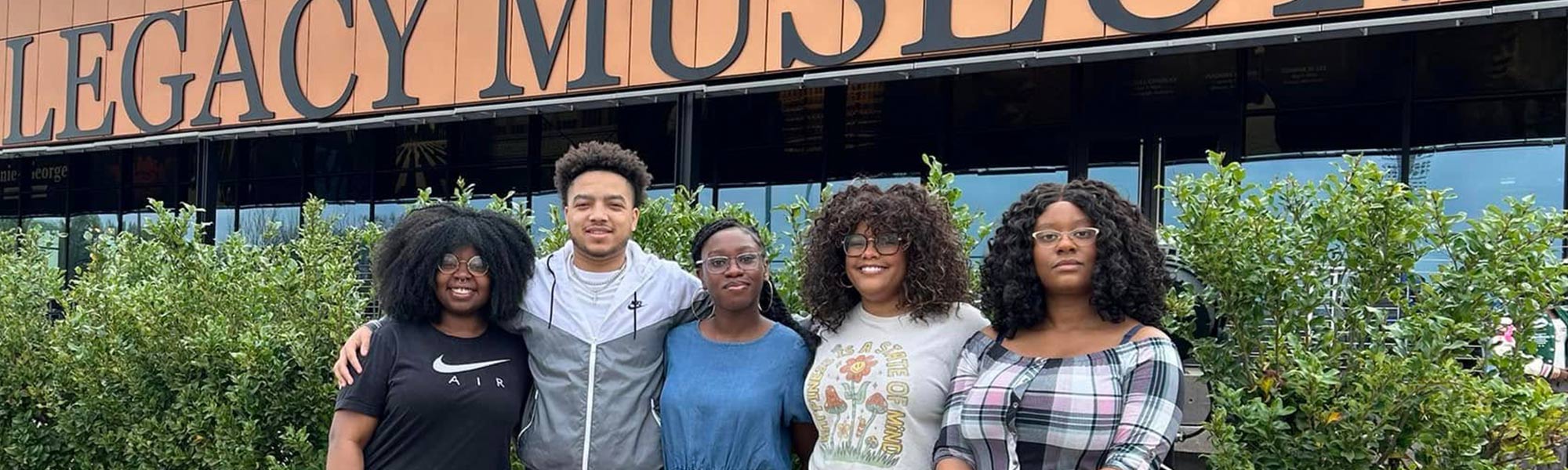 Five Ripon Students standing outside of the Legacy Museum in Selma, AB