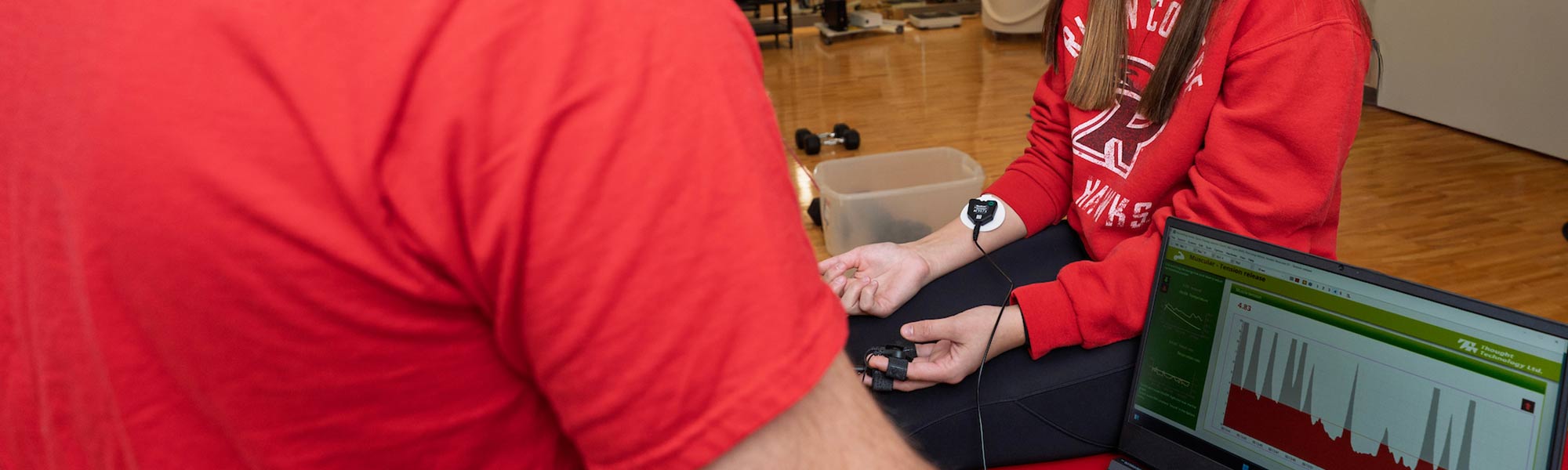 A student monitors another students vitals