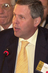 Aleman in front of a crowd.