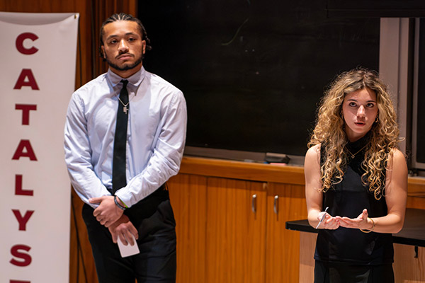 Two catalyst presenters in Bear Auditorium