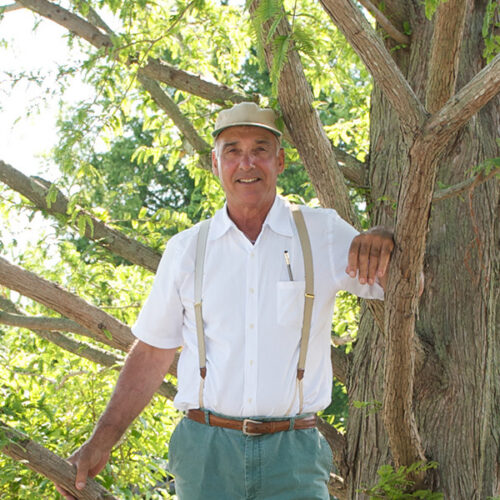 A man standing in a tree.