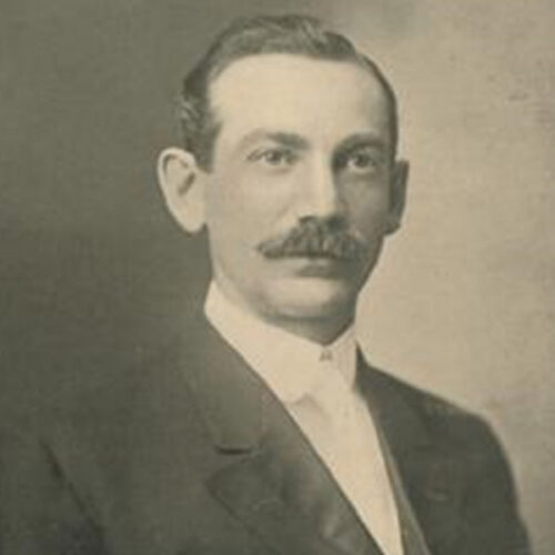 A man with a white bowtie.