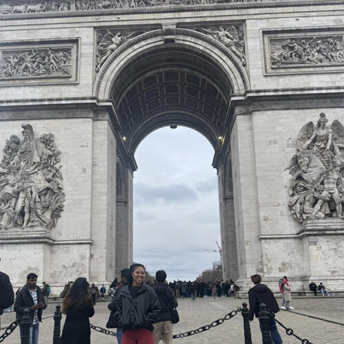 Ripon student smiles beneath Barcelona Arch