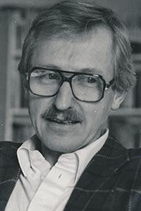 Hannaford with glasses and moustache 