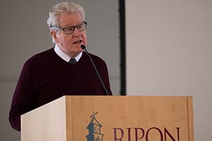 Smith speaking in Ripon at a podium