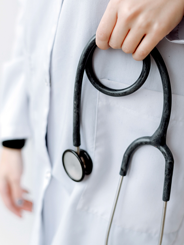 Doctor in white coat with stethoscope. Photo-by-Thirdman
