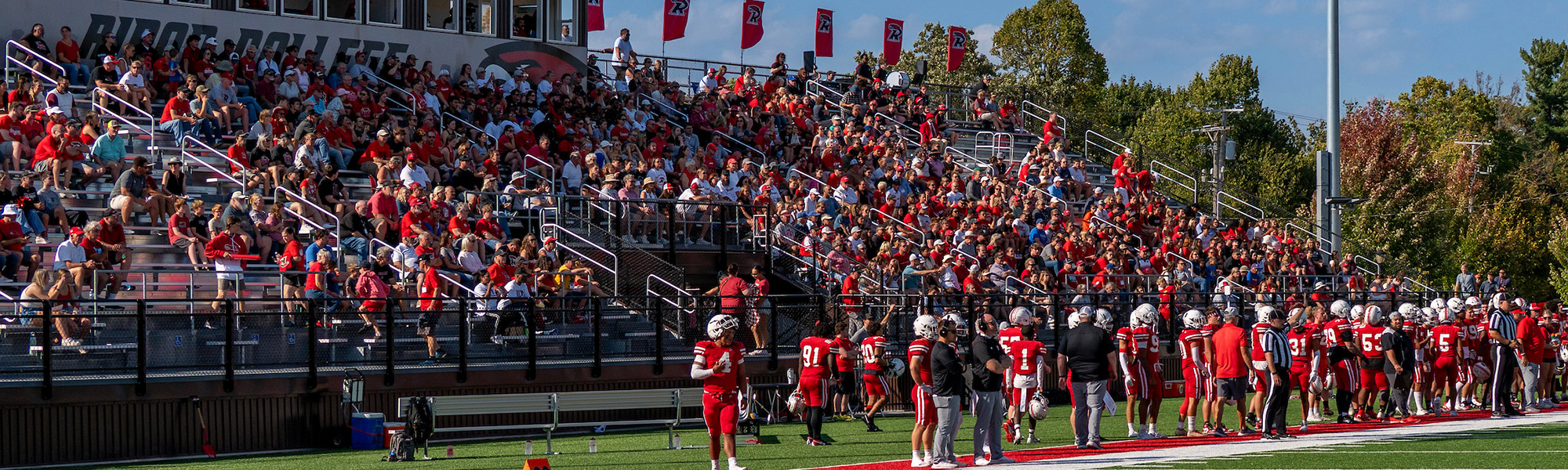 A large crowd cheers on the Redhawks in Hopp Stadium