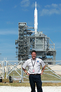 Huebner stands in front of Rocket set to launch
