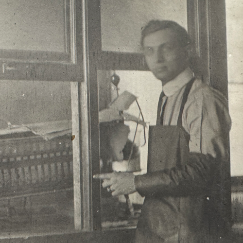 Otto stands in protective gear in a lab.