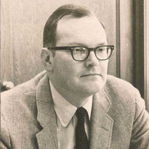 Tinkham in a suit and tie
