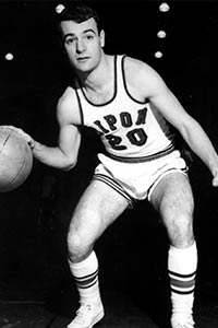 Bennett playing basketball as number 20 in Ripon
