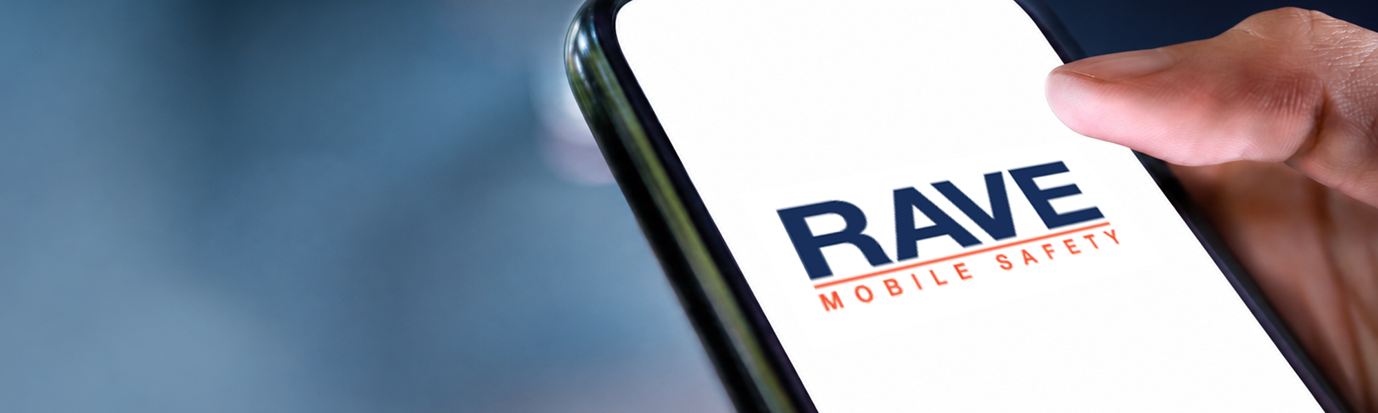 Mobile phone in hand with RAVE Mobile Safety logo