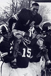 Jack being lifted by his team