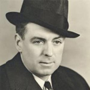 Lon wears a dapper hat.