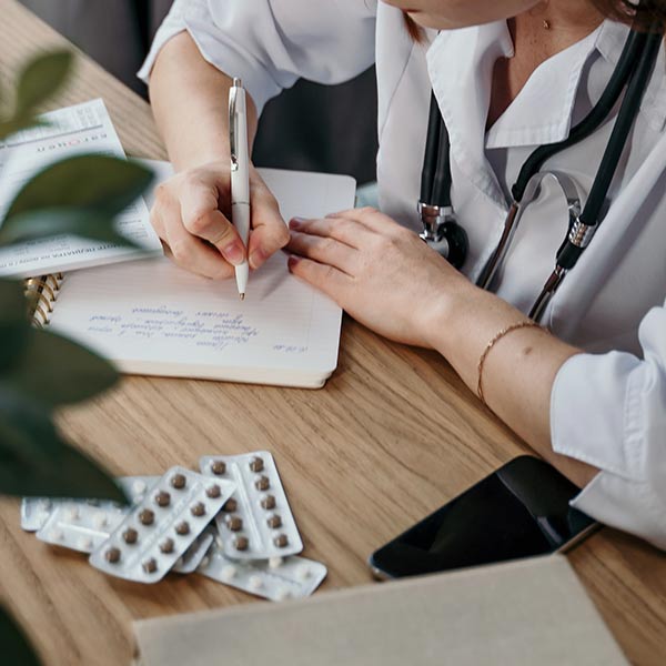 A pharmacist takes notes-Tima Miroshnichenko from Pexels