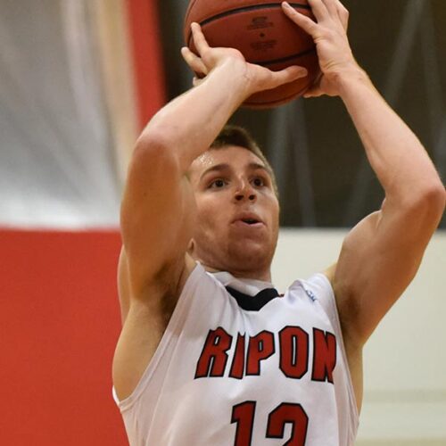 Sabin shoots a basketball