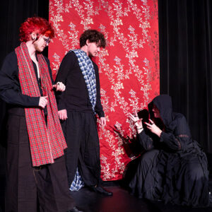 3 students in a production of Macb3th