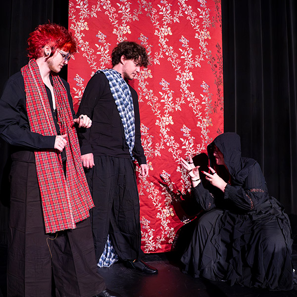 3 students in a production of Macb3th